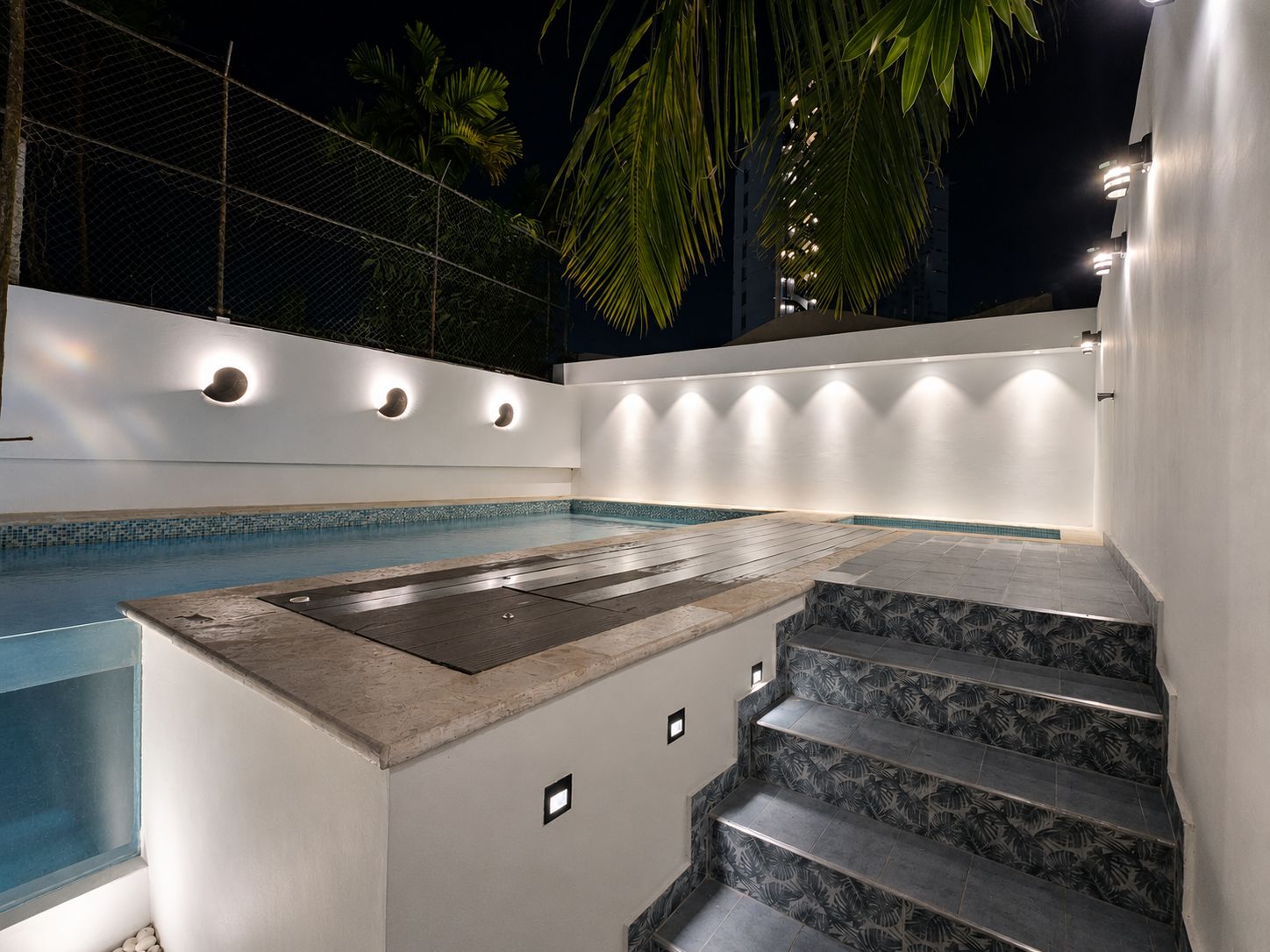 Hotelito Bonito pool illuminated in the evening
